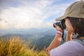 Hiker teens girl taking photo