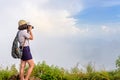 Hiker teens girl taking picture