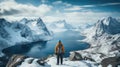 Hiker on the top of a mountain looking at the beautiful landscape Royalty Free Stock Photo