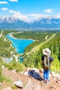 Staycation hike on top of mountain overlooking local town of Canmore and Kananaskis