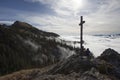 Hiker on top to summit Taubenstein mountain, Bavaria