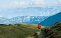 Hiker on the trail in the Swiss mountains. Lifetime experience