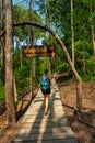 Hiker on a trail to Bua Tong Spring, Nam Phu Chet Si,.Thailand