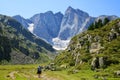 Hiker on a trek in the national park Pyrenees.Occitanie in south of France.