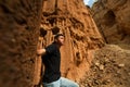 Hiker trekking through canyons