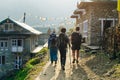 Hiker trekking in green mountains part of Everest trek in Himalayas, Near Karikhola village, Solukhumbu region, Nepal Royalty Free Stock Photo