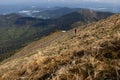 Hiker trekking to the highest ukrainian ridge Marmarosy near Romania. Royalty Free Stock Photo