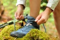 Hiker tying trekking boot laces Royalty Free Stock Photo