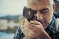 Hiker using a compass