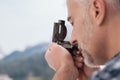 Hiker using a compass