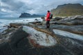 Hiker at Uttakleiv beach on Lofoten island