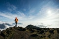 hiker walking in the beautiful landscape on mountain top Royalty Free Stock Photo