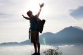 Hiker walking mountain path. Sunrise on top Royalty Free Stock Photo