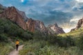 A hiker walking thtough the mountains of Big Bend National Park Royalty Free Stock Photo