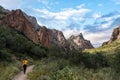 A hiker walking thtough the mountains of Big Bend National Park Royalty Free Stock Photo