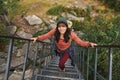 Hiker walking up steps Royalty Free Stock Photo