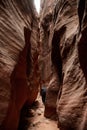 Hiker Walking Through Wire Pass Slot Canyon