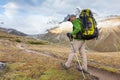 Hiker walks on train Royalty Free Stock Photo