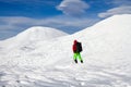 Hiker in winter mountains.