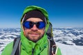 Hiker in winter mountains on sunny day Royalty Free Stock Photo