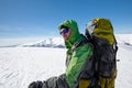 Hiker in winter mountains on sunny day Royalty Free Stock Photo