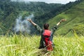 Hiker woman happy feeling freedom good and strong weight victorious facing on the natural mountain. Royalty Free Stock Photo