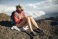 Hiker woman reading book on sloops of Mt Etna Royalty Free Stock Photo