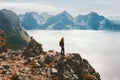 Hiker woman traveling in Norway adventure active vacations outdoor healthy lifestyle trip