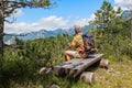 Hiker about 60 years old watching the Alpine panorama.