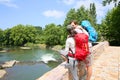 Hikers admiring the river and nature Royalty Free Stock Photo