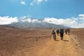 Hikers against a mountain background, Mount Kilimanjaro