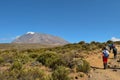 Hikers against a mountain background, Mount Kilimanjaro