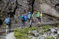 Hikers with backpack on trekking trail in Himalayan mountains. Nepal Royalty Free Stock Photo