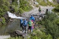 Hikers with backpack on trekking trail in Himalayan mountains. Nepal Royalty Free Stock Photo