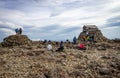 Hikers on the Ben Nevis summit, in Scotland