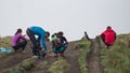 Hikers and caraca bird at the Pichincha volcano, Ecuador