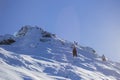 Hikers climb in heavy snow