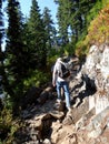 Hikers climbing wooden steps