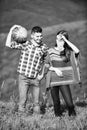 Hikers couple in love. Man bring watermelon for picnic in mountains. Summer vacation. Pleasant hike picnic. Fruits Royalty Free Stock Photo