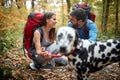 Hikers couple in love taking a break at hiking Royalty Free Stock Photo