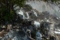 Hikers Cross Bridge over Wapama Falls