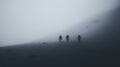 Hikers at distance during a strong blizzard