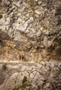 Hikers doing the Cares route in Picos de Europa Royalty Free Stock Photo