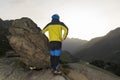 Hikers enjoy the landscape with the sunrise from a viewpoint