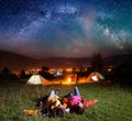 Hikers enjoying the bright stars and lying on the grass Royalty Free Stock Photo