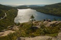 Hikers Enjoying The View Of Jordan Pond In Acadia National Park In Maine