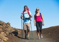 Hikers enjoying walk on amazing mountain trail