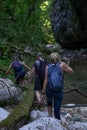Hikers exploring a canyon Royalty Free Stock Photo