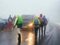 Hikers on Foggy Road in Black Forest