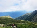 Hikers hiking Lion Head trail on the Mt. Washington